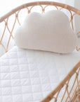 Bambella Designs Ivory waterproof co-sleeper cot sheet styled with a pillow