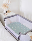 Co Sleeper Cot Next to Bed with Sage Sunshine Waterproof Sheets