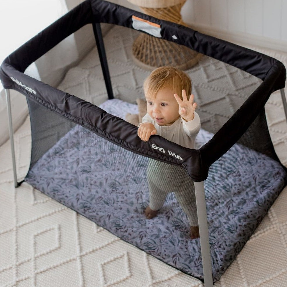 Travel cot sale waterproof sheet